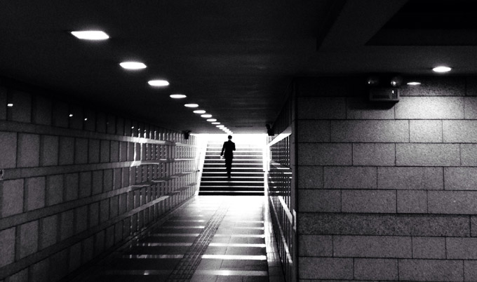 Man walking in an underground passage