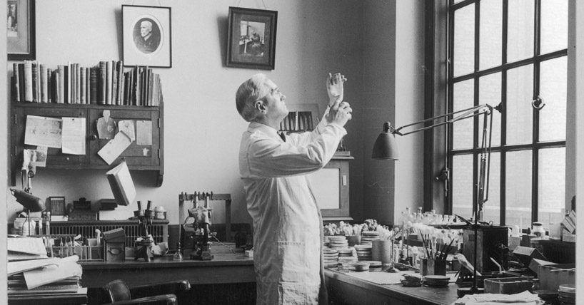 Sir Alexander Fleming in his lab