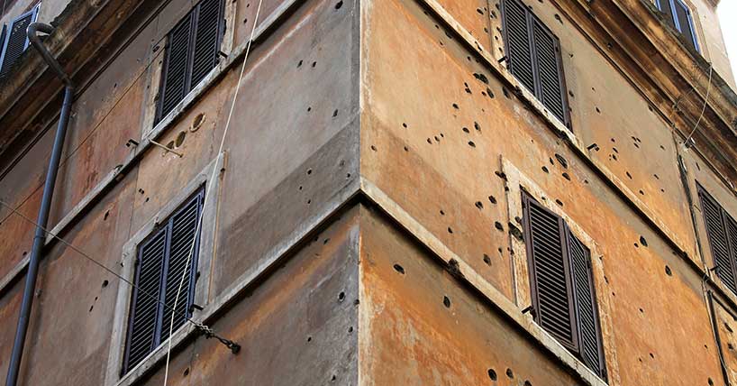 Bullet holes in the buildings of Via Rasella in Rome.
