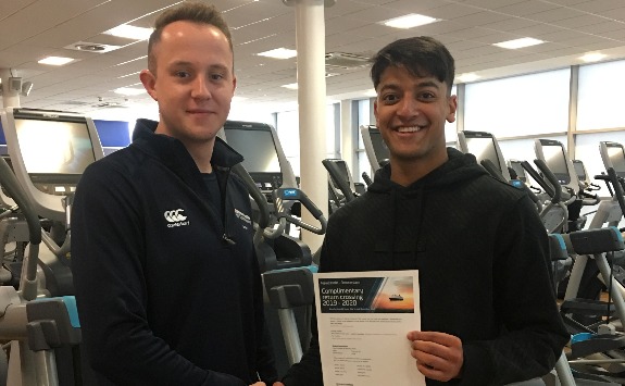 Ishan Aggarwal, winner of our Summer Health Challenge, receives his prize from Sport and Recreation Officer James Hankinson.