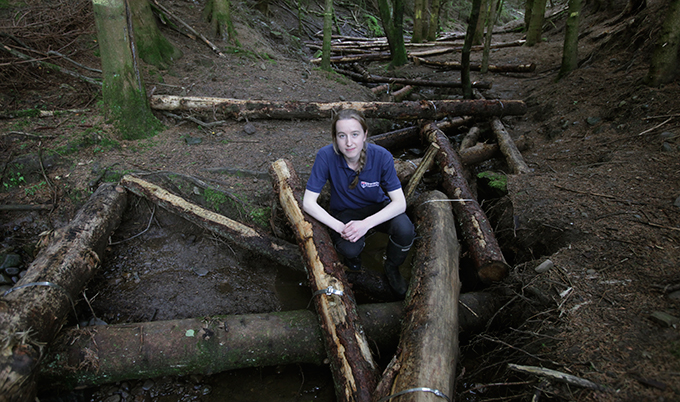 PhD student Eleanor Starkey pictured at the Kerplunk scheme at Slaty Skie, Haltwhistle