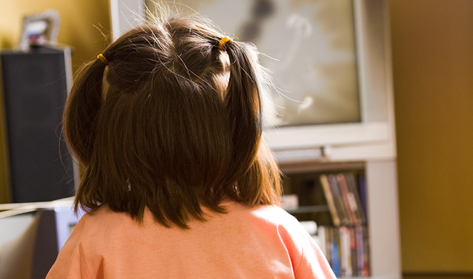 child watching TV