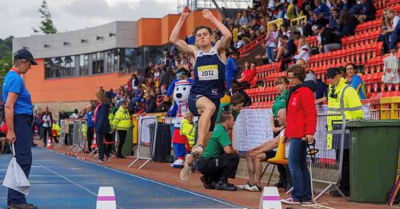 Sam Pooley competing at the Long Jump