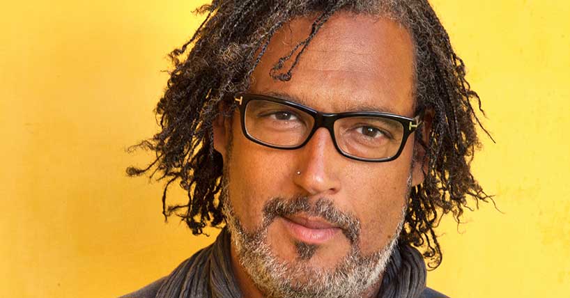 A headshot of the historian Professor David Olusoga