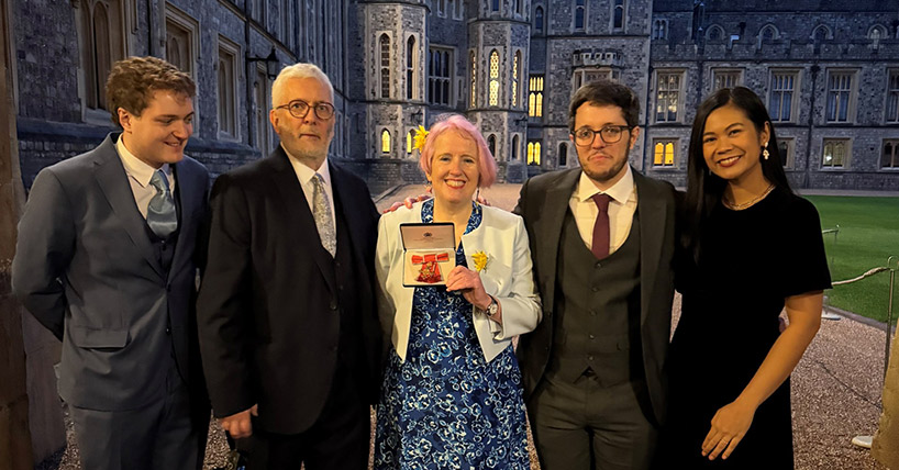 Professor Liz Todd is invested with her OBE at Windsor Castle