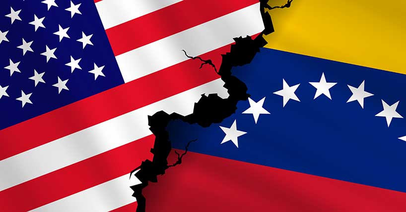 A graphic depicting the US and Venezuelan flags breaking apart
