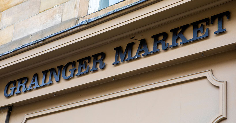 Grainger Market sign for poet in residence story Grainger Market sign for poet in residence story