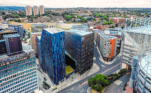 Aerial view of Newcastle Helix, showing Newcastle University Business School, nearby buildings, roads, and St James