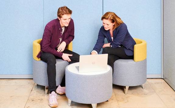 A Business School student looking at a laptop in a session with Careers Consultant Jo Craggs