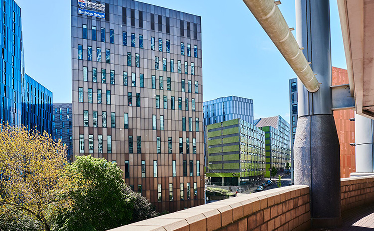 The main building of Newcastle University Business School viewed from St James Park