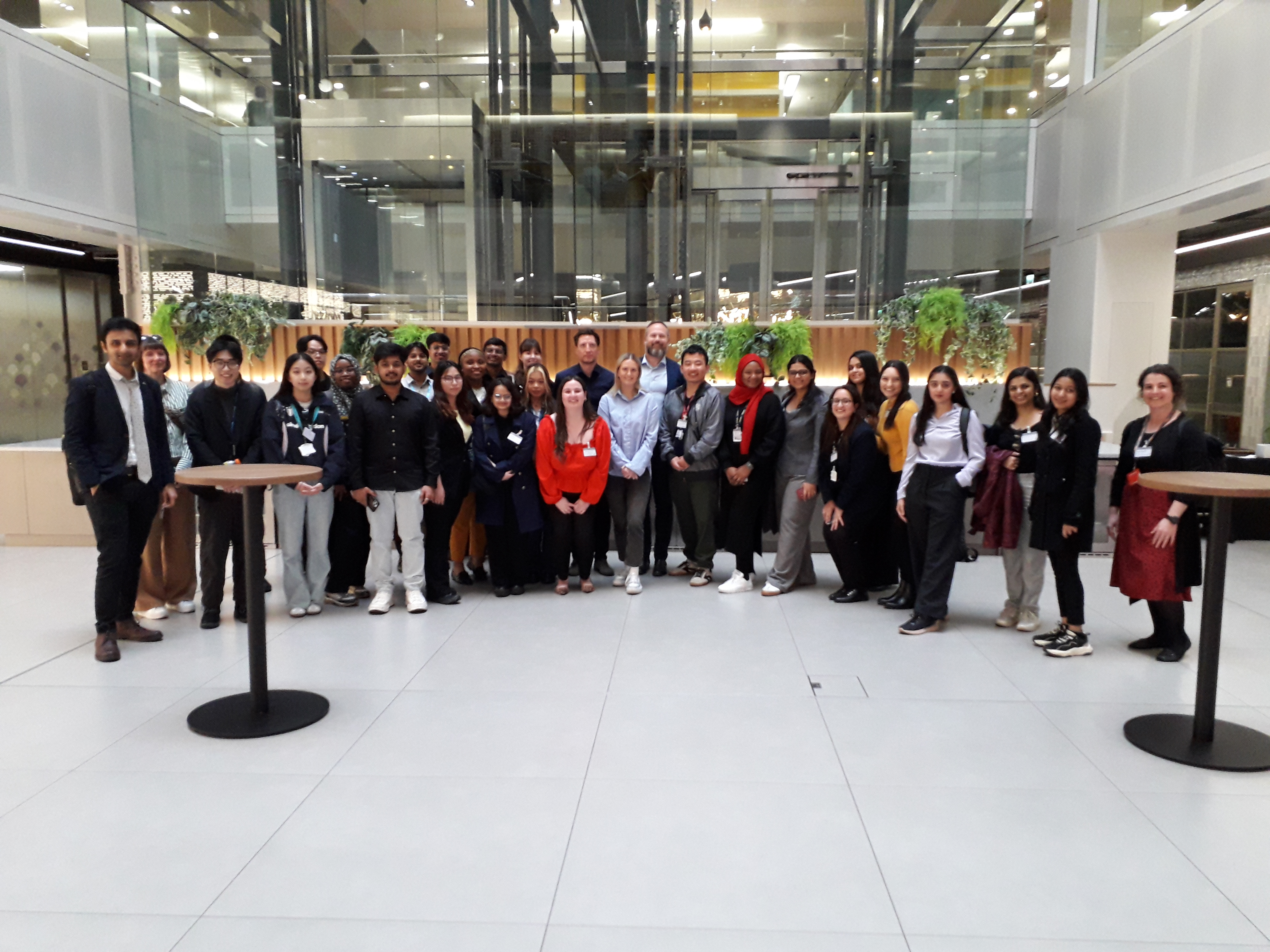 Group photo taken inside PwC