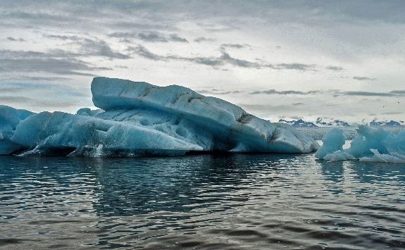 Ice burg floating in the water