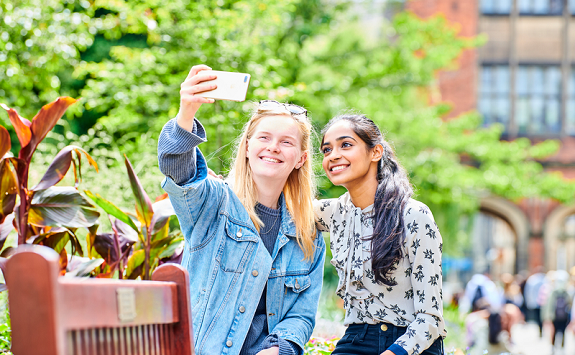 students-outside-phone