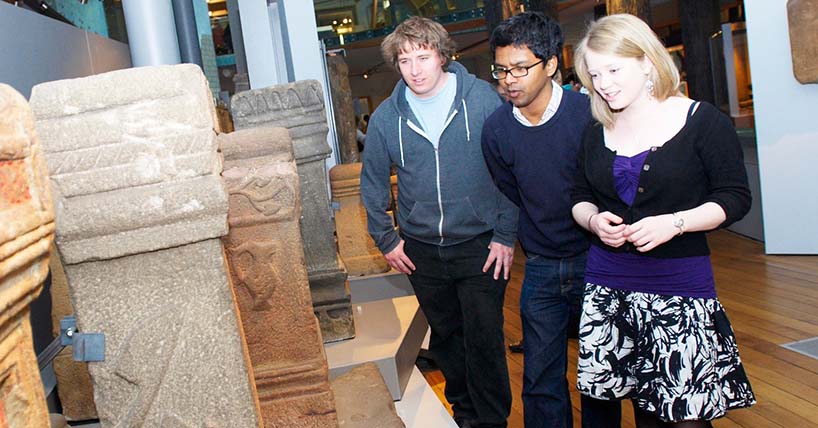 Undergraduate archaeology students look at the Great North Museum: Hancock collections.