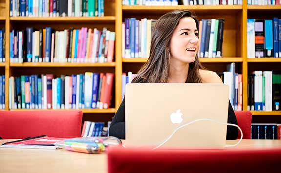 A student works on her thesis.