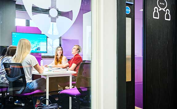 Collaborative study room in the Marjorie Robinson Library.