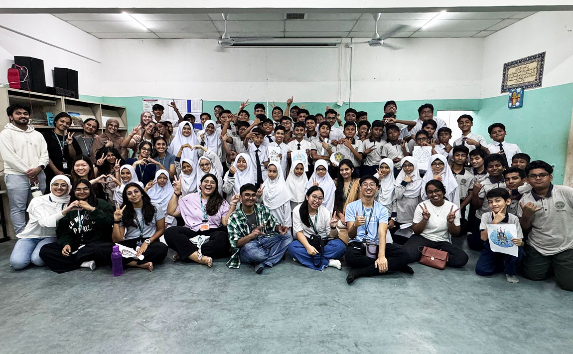 A group of students posing for the image
