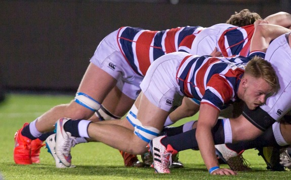 Newcastle Rugby Union team in a scrum.