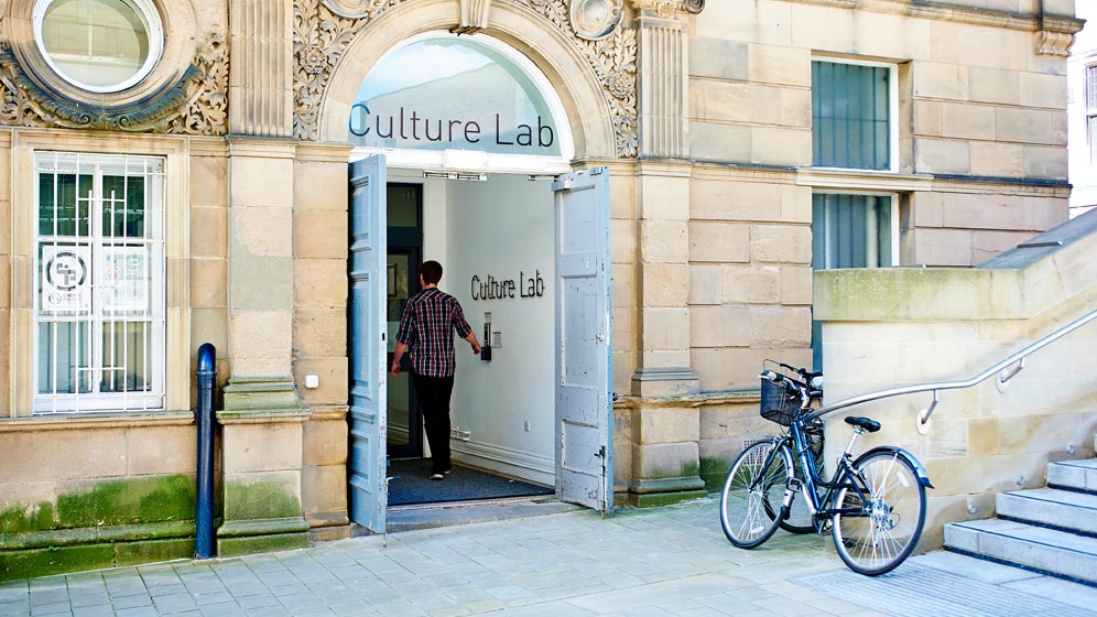 A student walks into Culture Lab