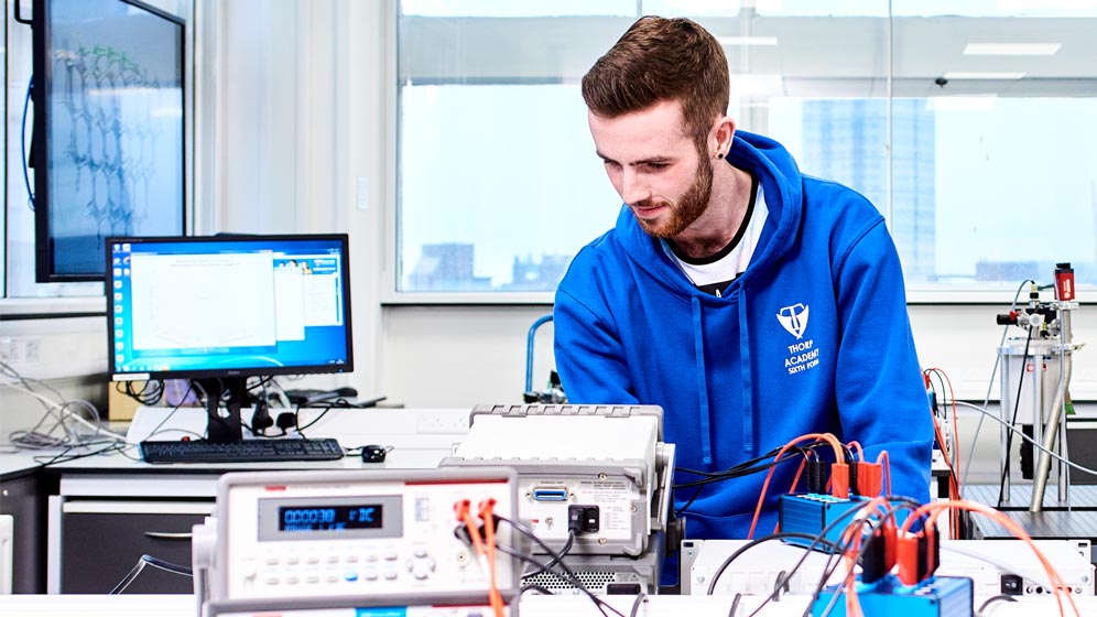 A student in a physics lab