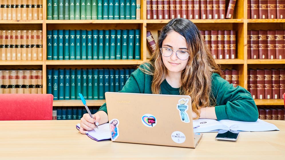 A student working in the Law Library