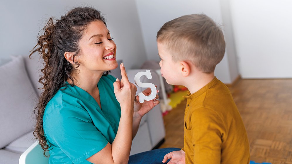 Speech and Language student working with child