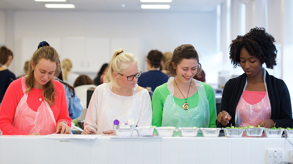 food and nutrition students in a lab