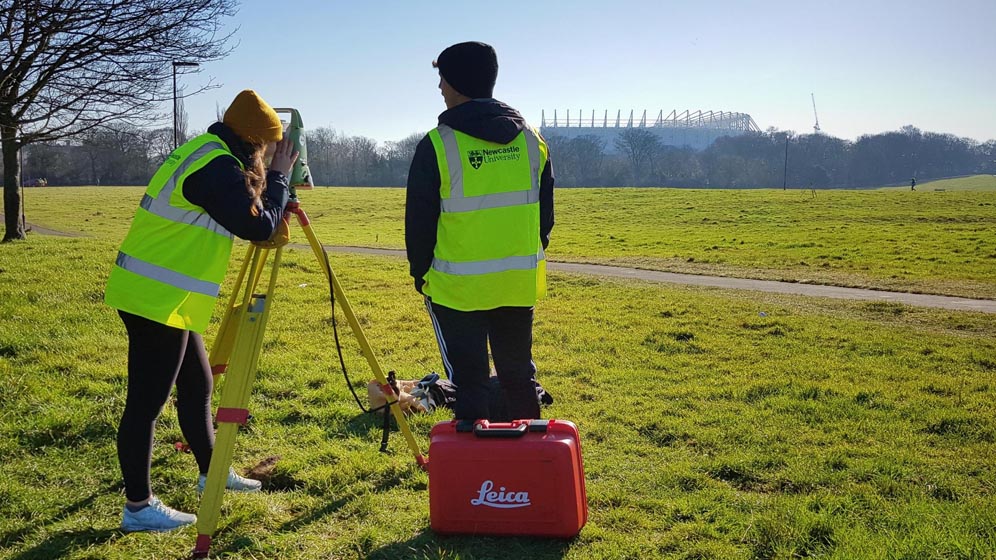 Geospatial students surveying in Leazes Park, Newcastle.