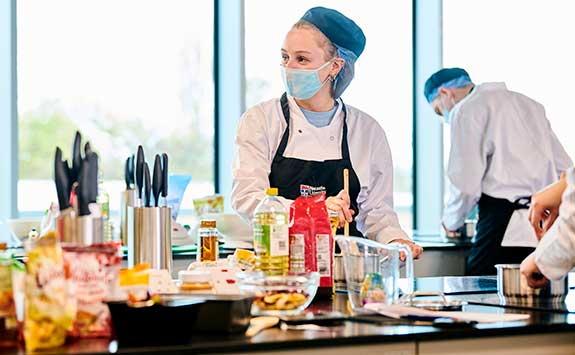 Food and Human Nutrition students in the kitchen.
